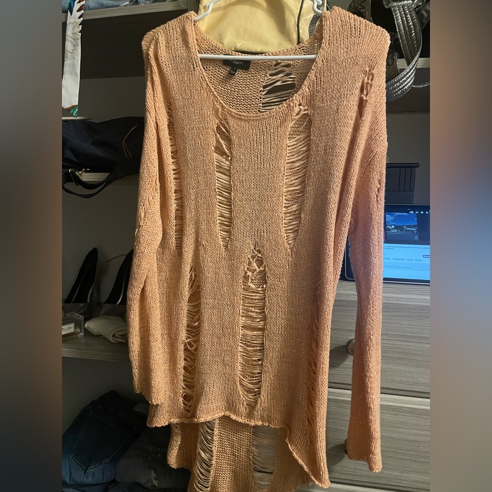 Light weight shredded sweater
